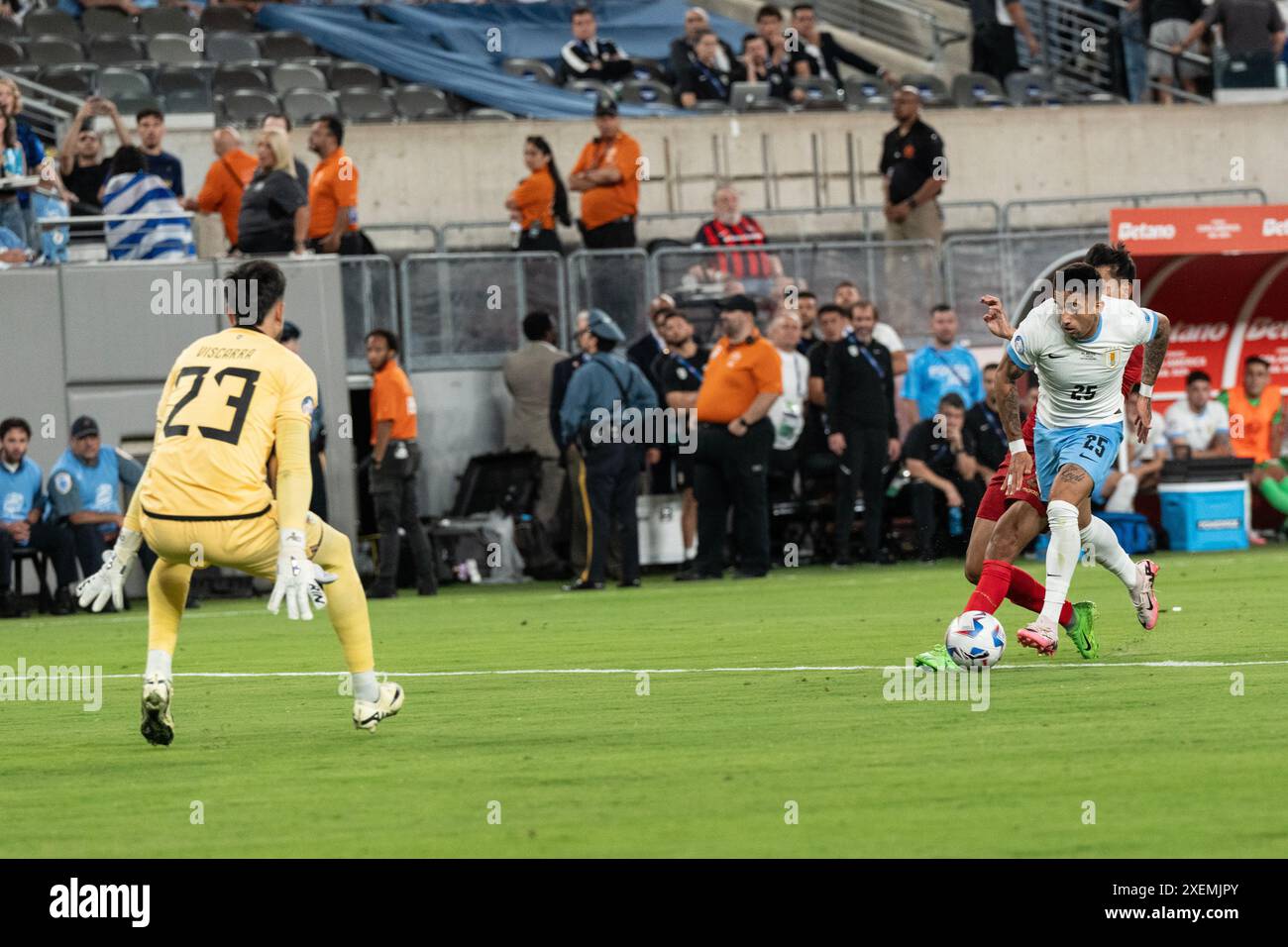 Cristian Olivera (25) of Uruguay controls ball during group stage game