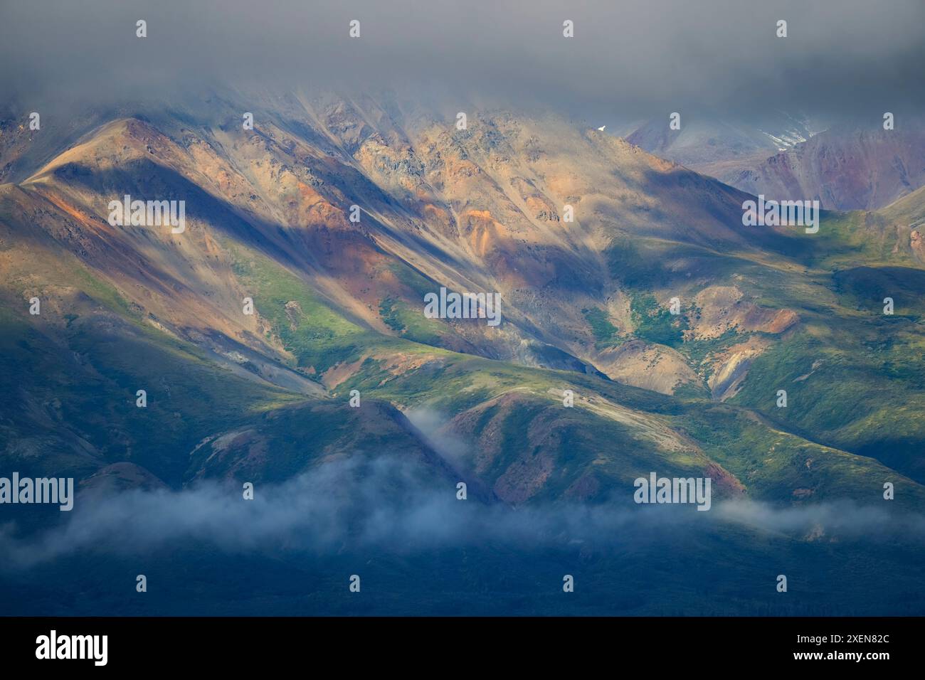 Aerial view of the mountains around Haines Junction looking beautiful as the clouds clear, creating a seriously, moody atmosphere Stock Photo