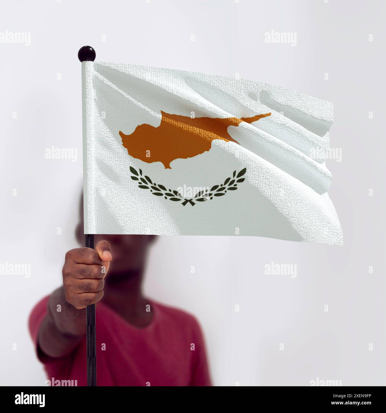 Black african male holding Cyprus national flag against white ...