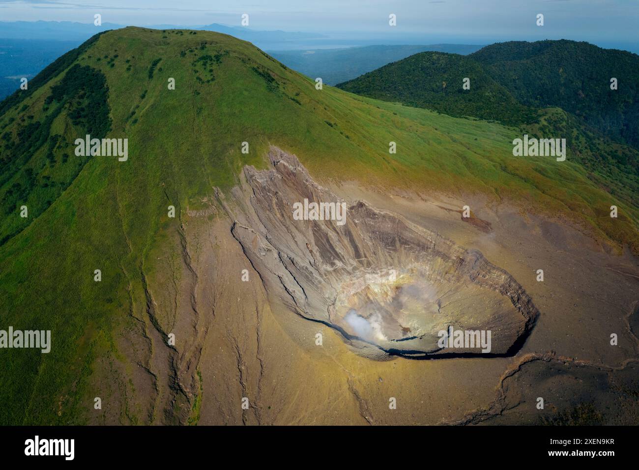 Mount Lokon crater with steam in North Sulawesi, Indonesia; Agotey, Mandolang, Minahasa Regency, North Sulawesi, Indonesia Stock Photo