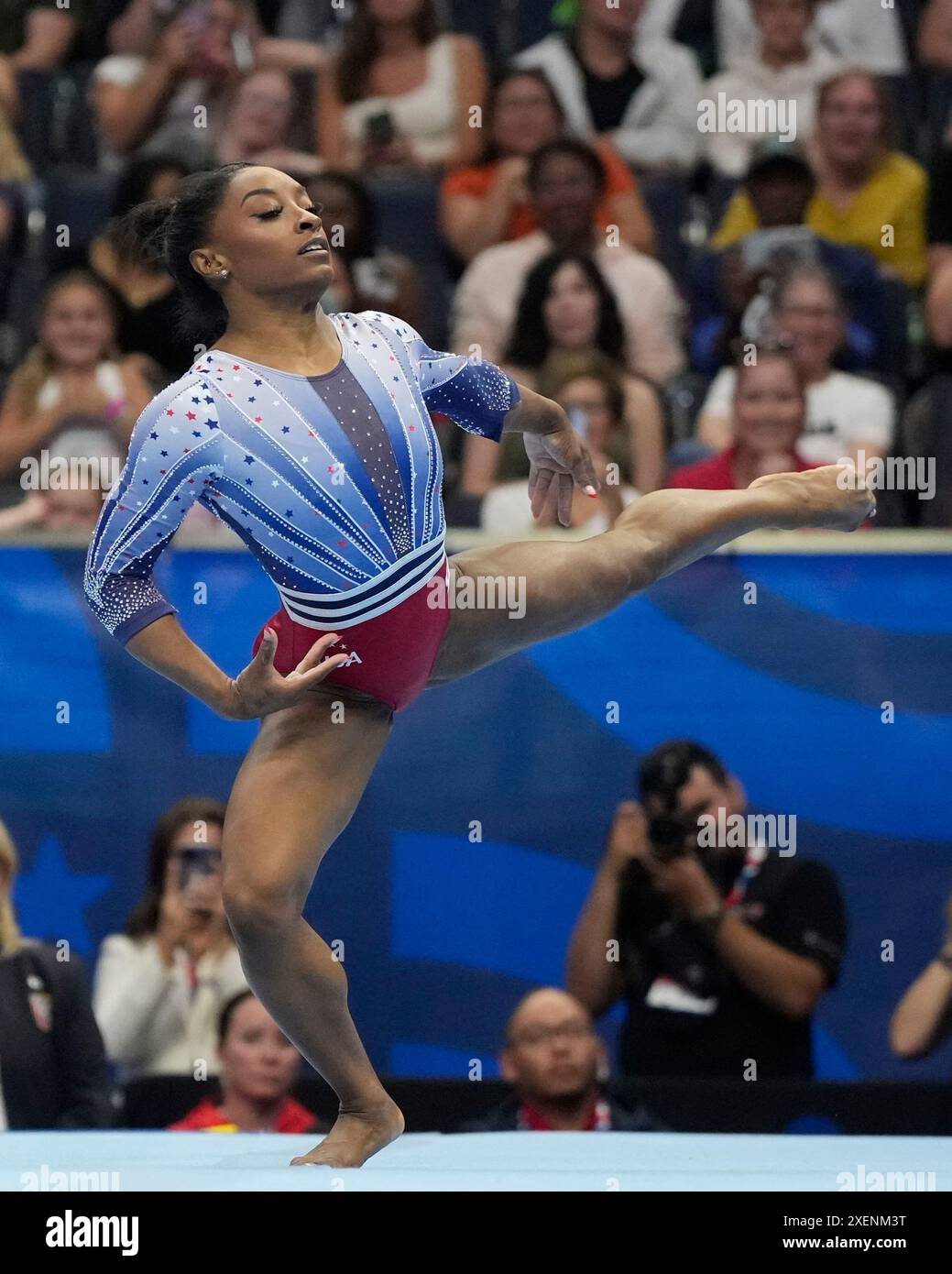 Simone Biles competes in the floor exercise at the United States ...