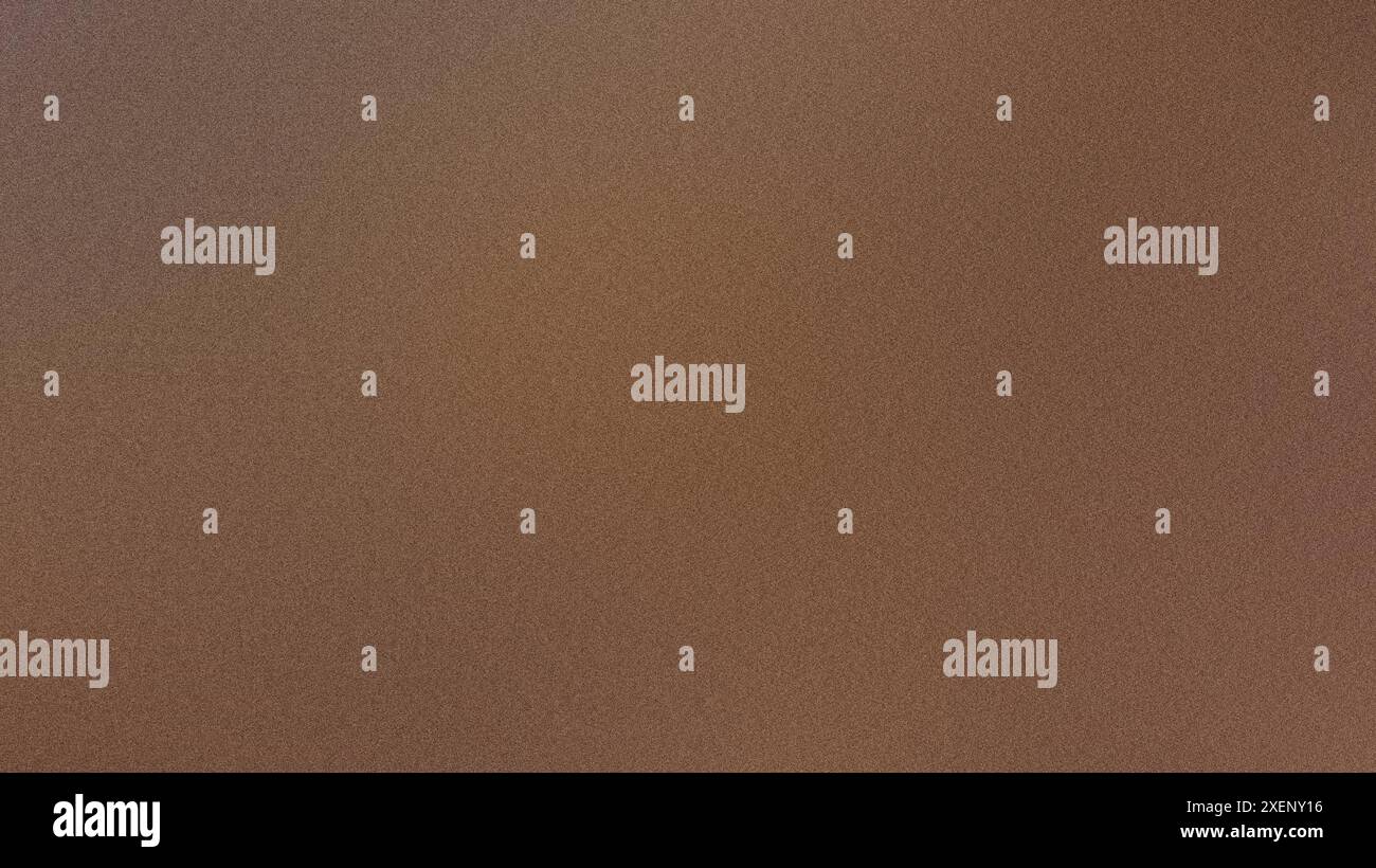 Grainy brown gradient background with a subtle noise effect Stock Photo
