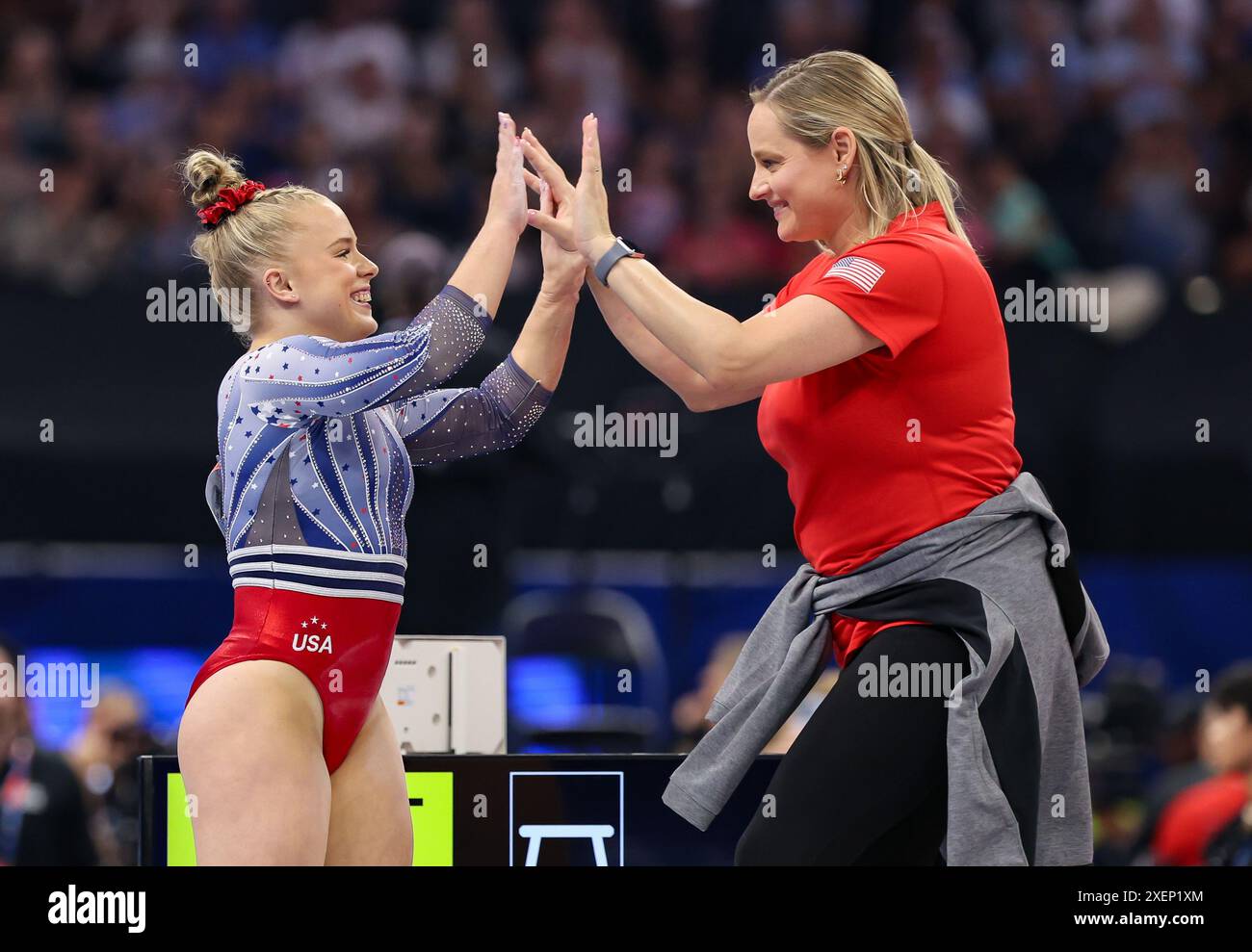 June 28, 2024 Joscelyn Roberson high fives her coach, Cécile