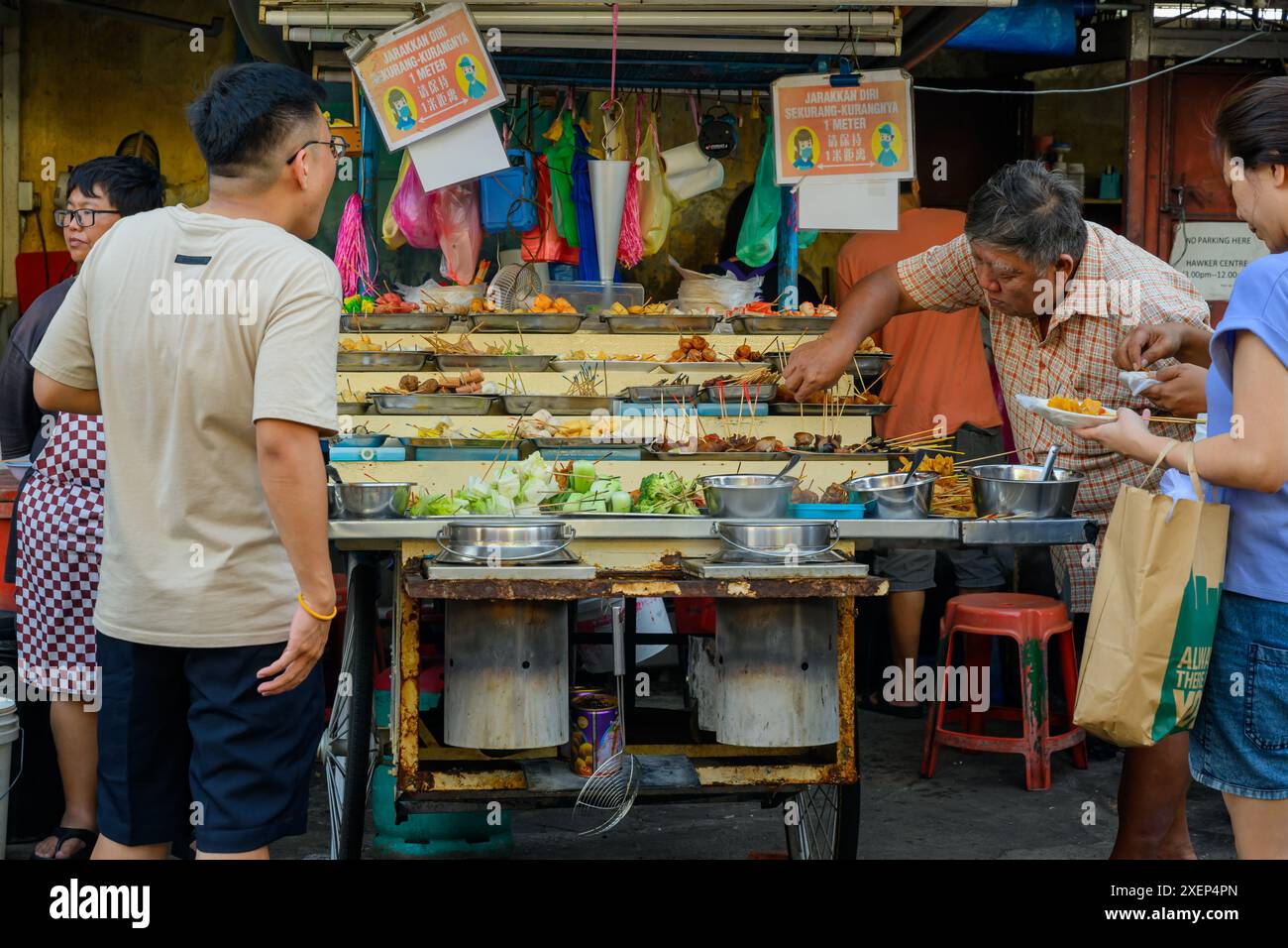Buying Malaysian Street Food in George Town, Penang, Malaysia Stock ...