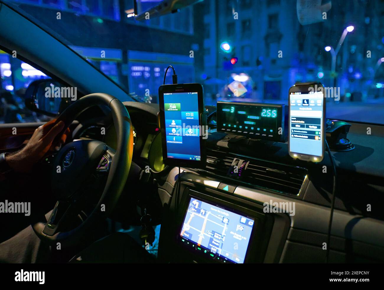 Smartphone screens, GPS, meter, etc. Cab. Barcelona. Catalonia. Spain. Stock Photo