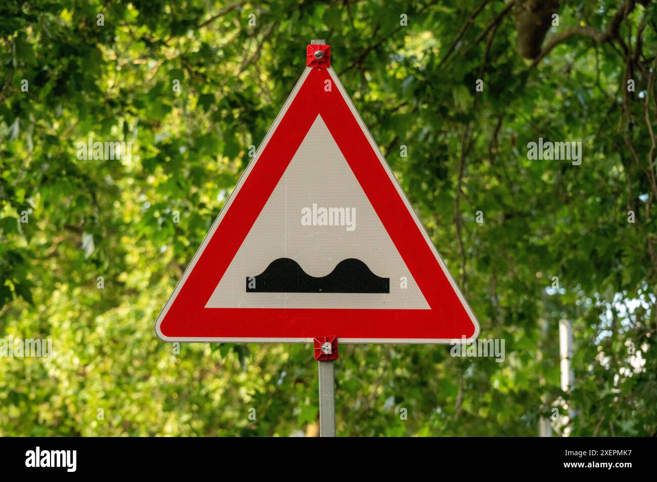 Bumpy road sign Stock Photo - Alamy
