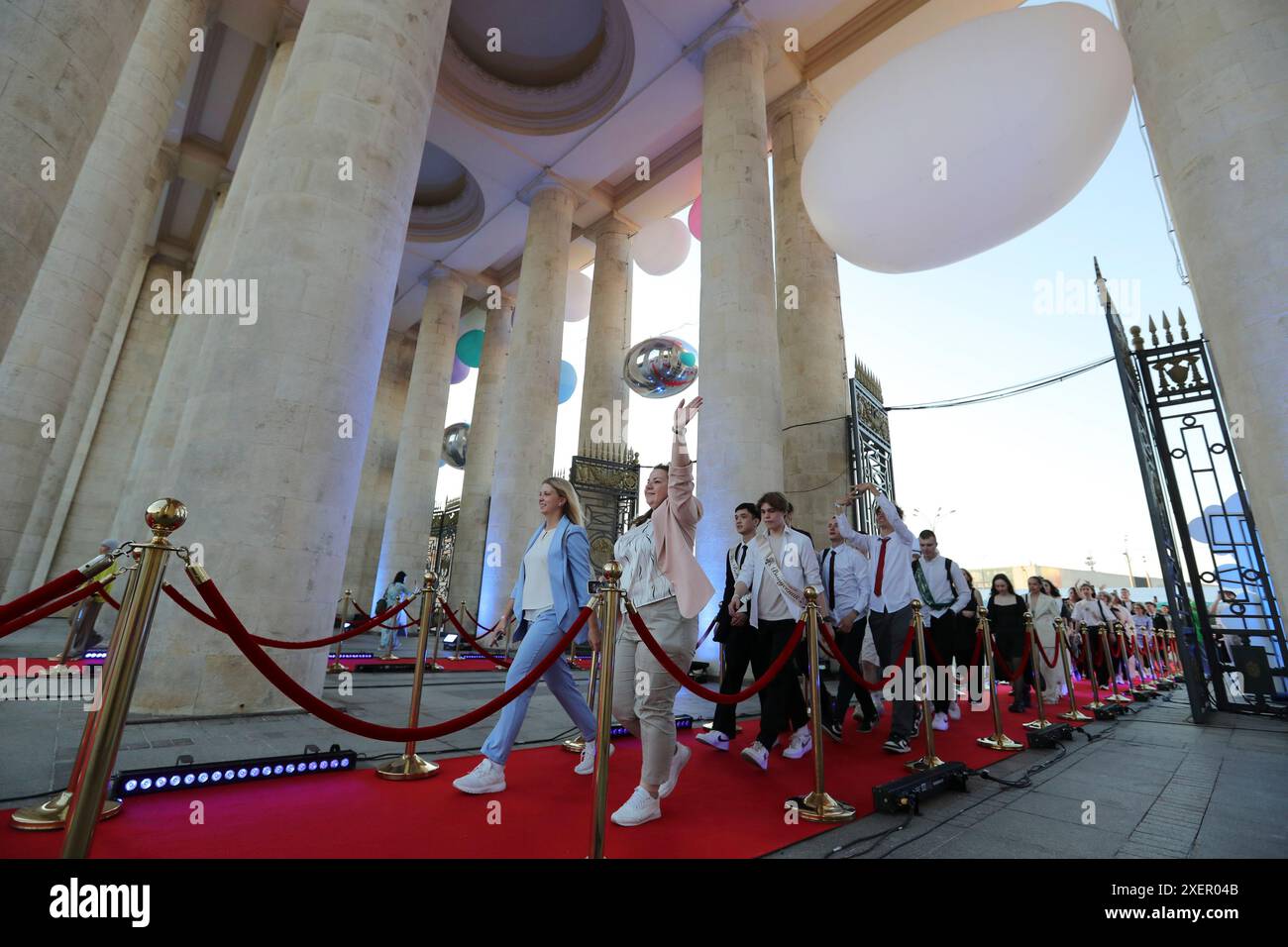 Moscow, Russia. 28th June, 2024. High school graduates arrive for a graduation party at Gorky Park in Moscow, Russia, on June 28, 2024. Credit: Alexander Zemlianichenko Jr/Xinhua/Alamy Live News Stock Photo