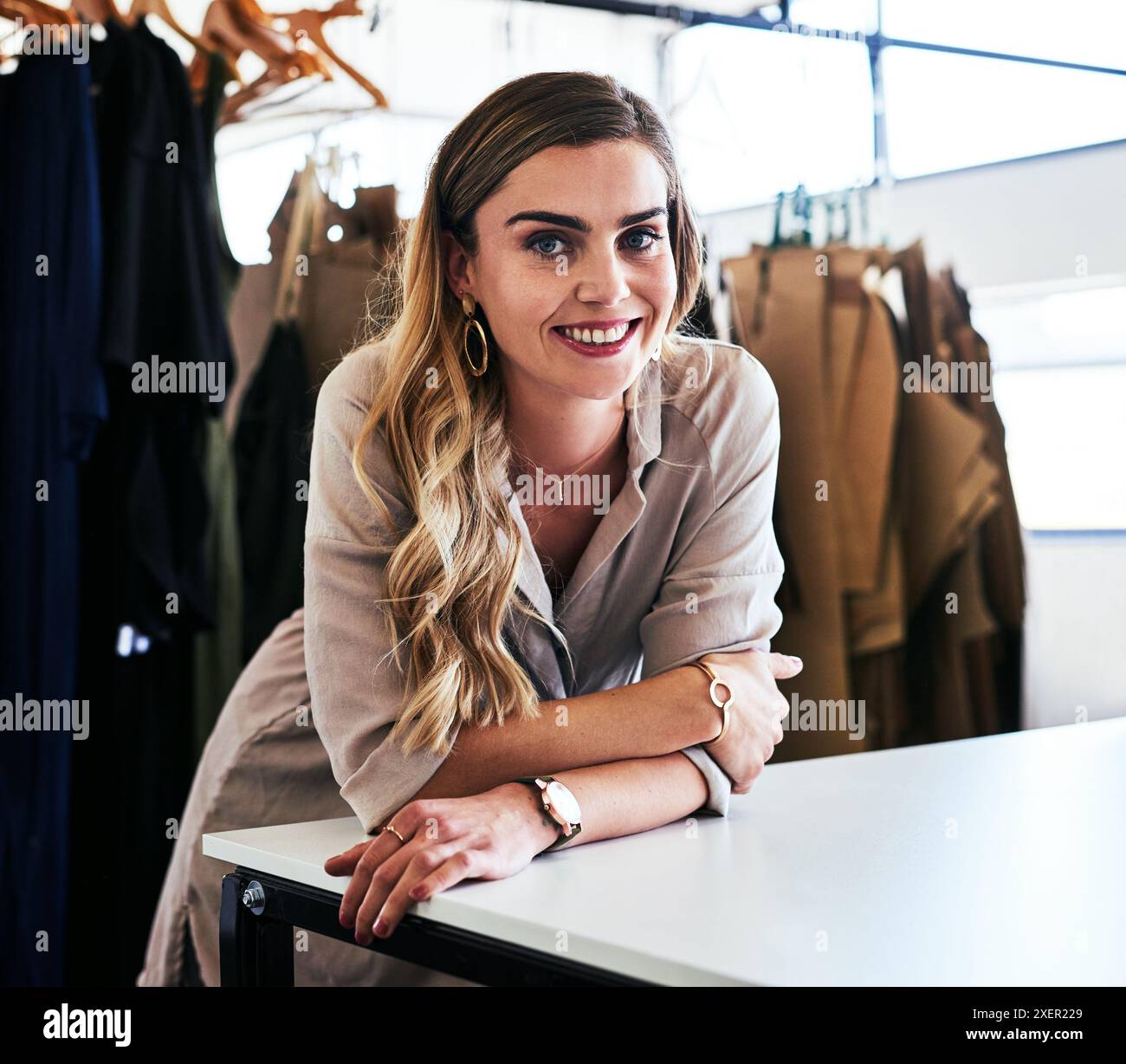 Confident woman clothing designer hi-res stock photography and images ...