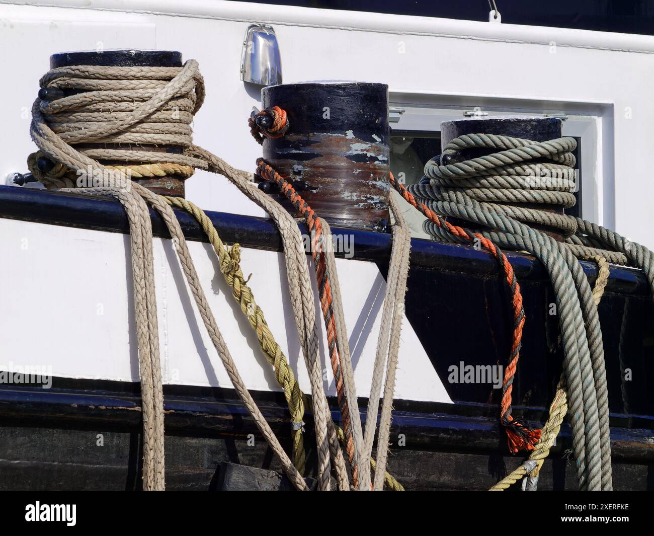 Coiled ropes on a ship on the Datteln-Hamm Canal, Germany, close up ...