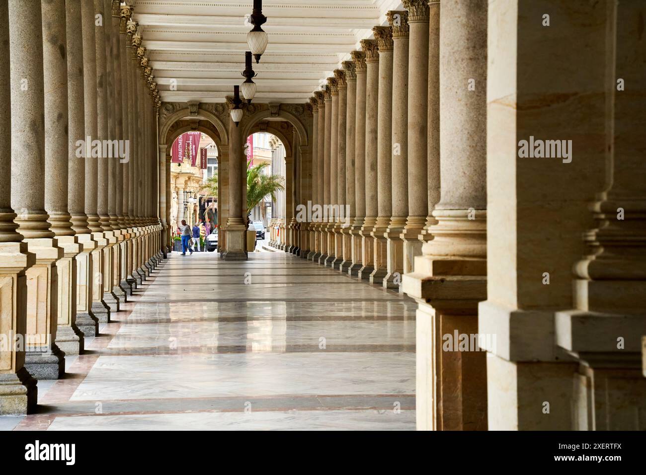 Karlsbad, Czechia, June 10, 2024: the historical colonnades of Karlovy Vary, featuring stone columns and marble flooring Stock Photo