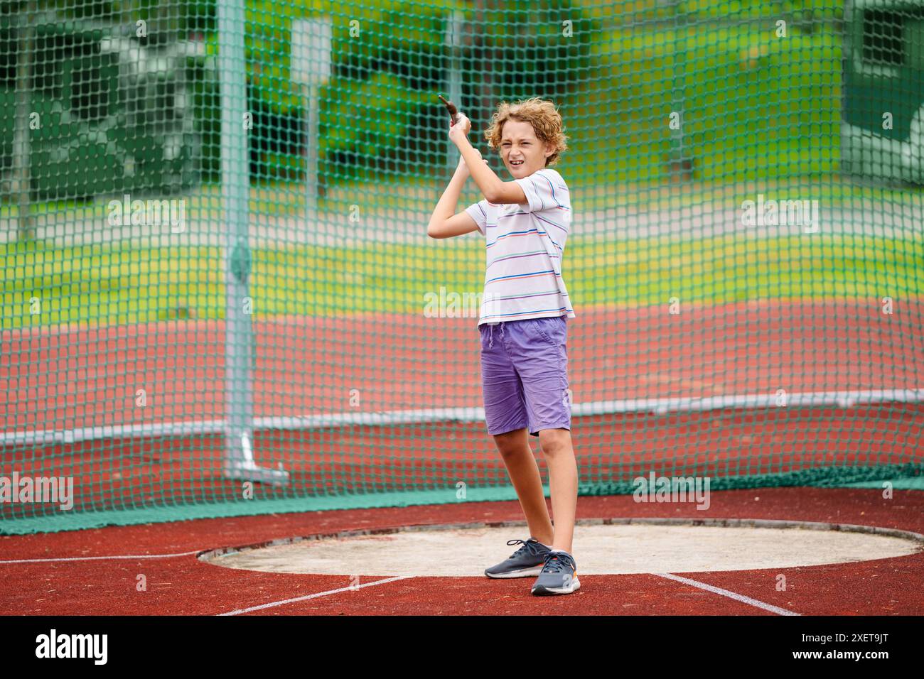 Javelin throw competition for kids. Athletics club training in school