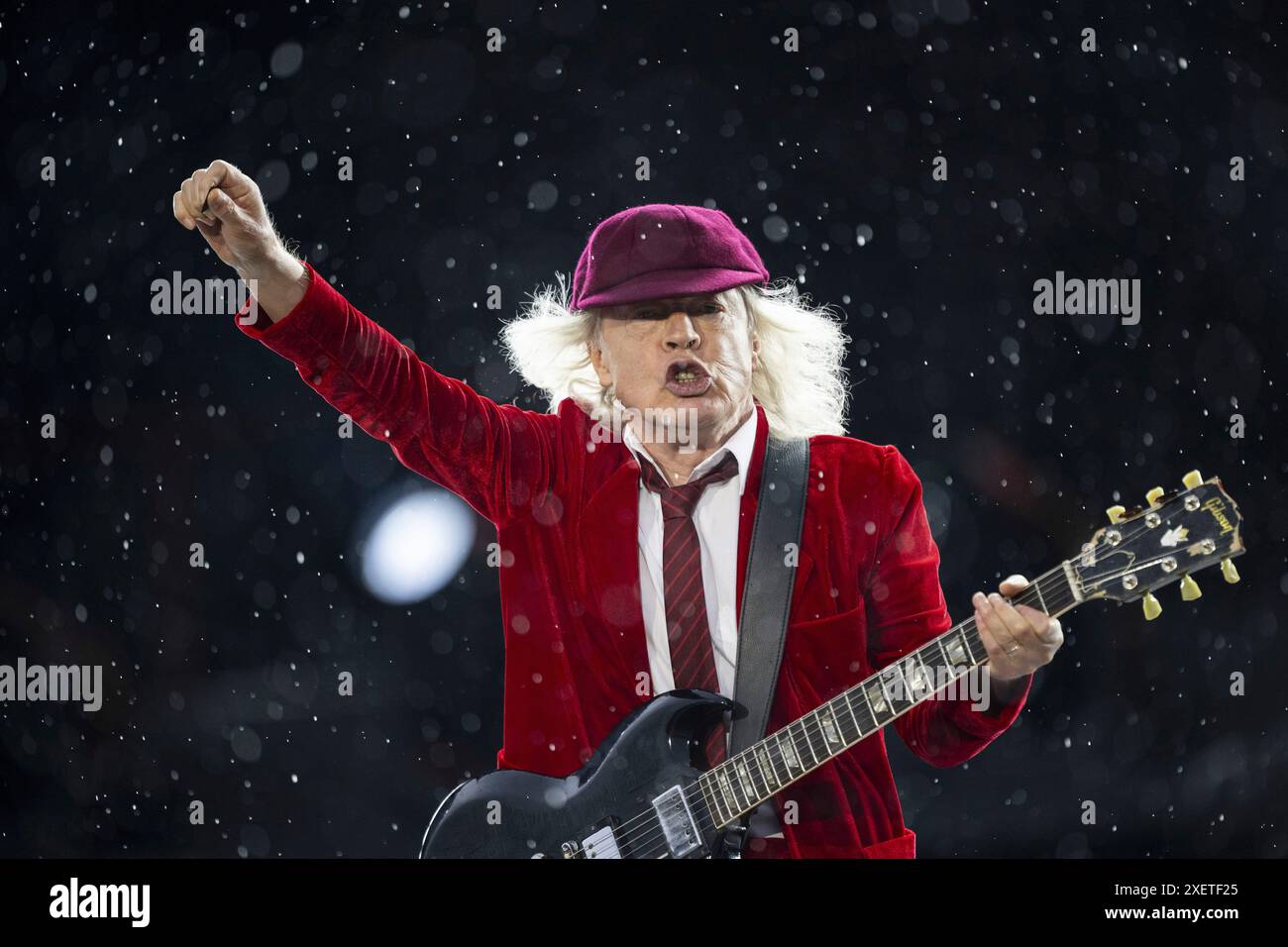 Guitarist Angus Young of hard rock band AC/DC performs on stage during the  concert at Letzigrund stadium in Zurich, Switzerland, Saturday, June 29,  2024. (Ennio Leanza/Keystone via AP Stock Photo - Alamy