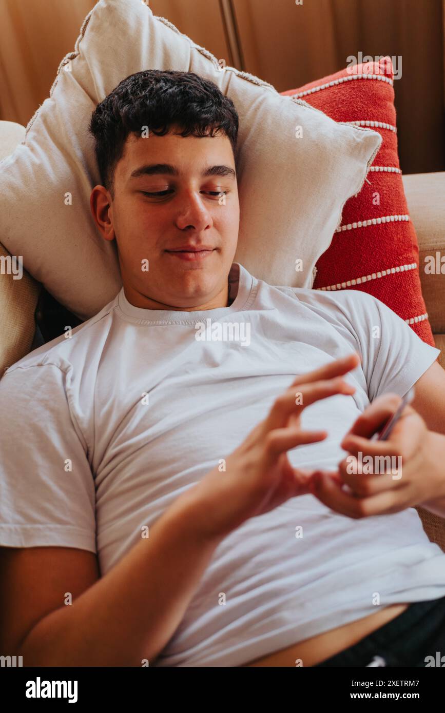 Happy peaceful teen boy hi-res stock photography and images - Alamy