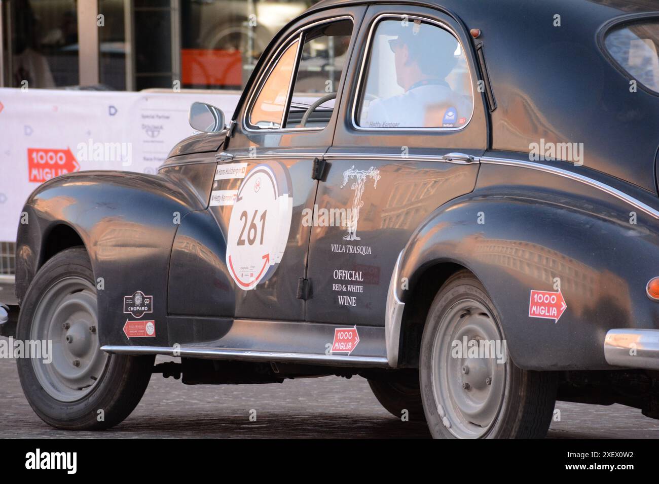 FERRARA , ITALY - jun 15 -2024 : A classic car races through the