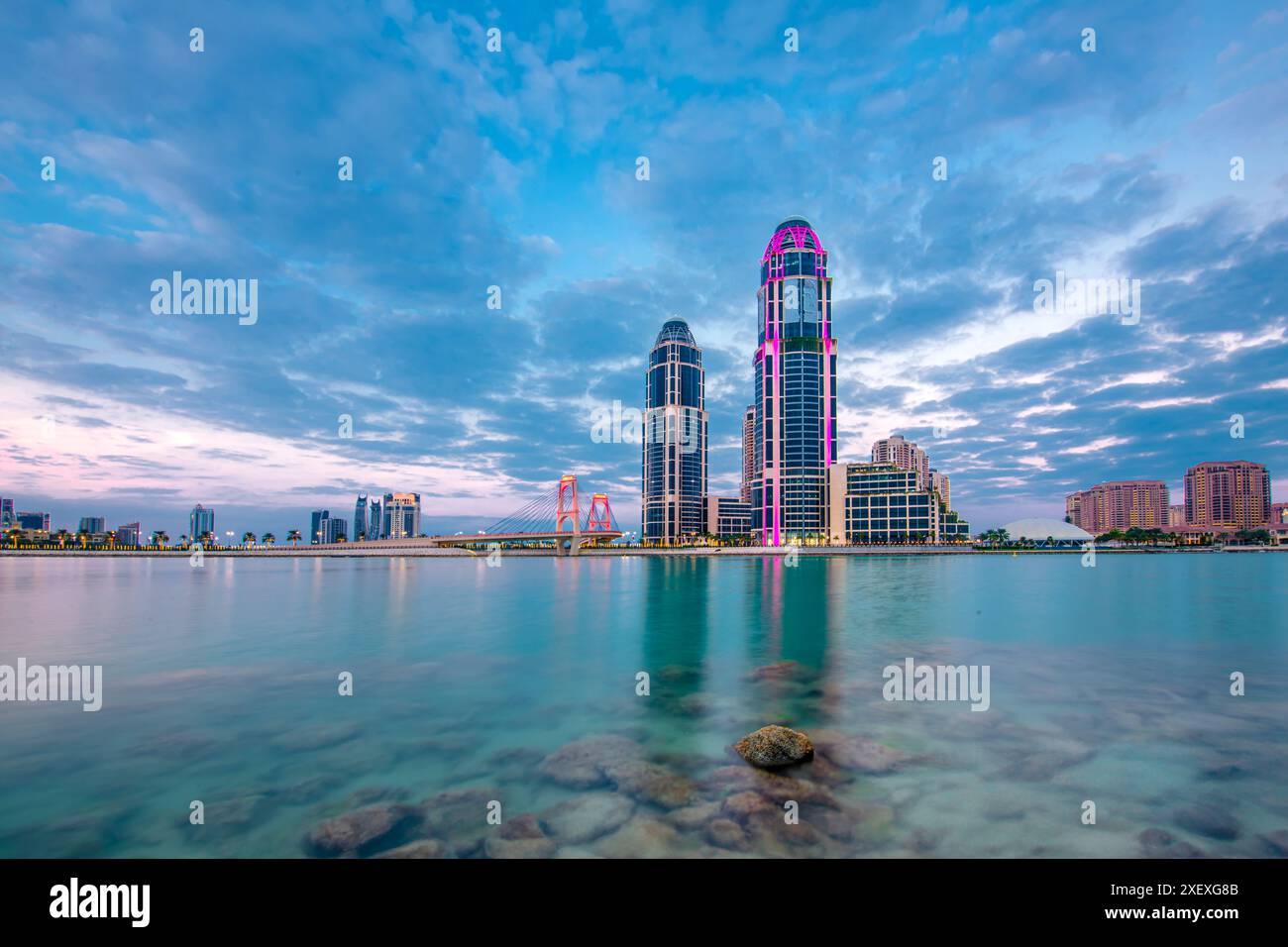 UDC twin tower Pearl Qatar view with gewan bridge Stock Photo - Alamy