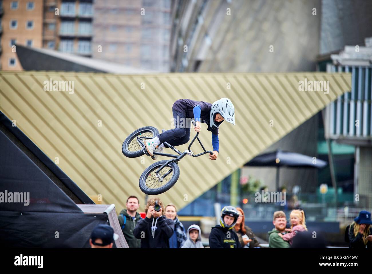 BMX stunts at Salford Quays  MediaCityUK Stock Photo