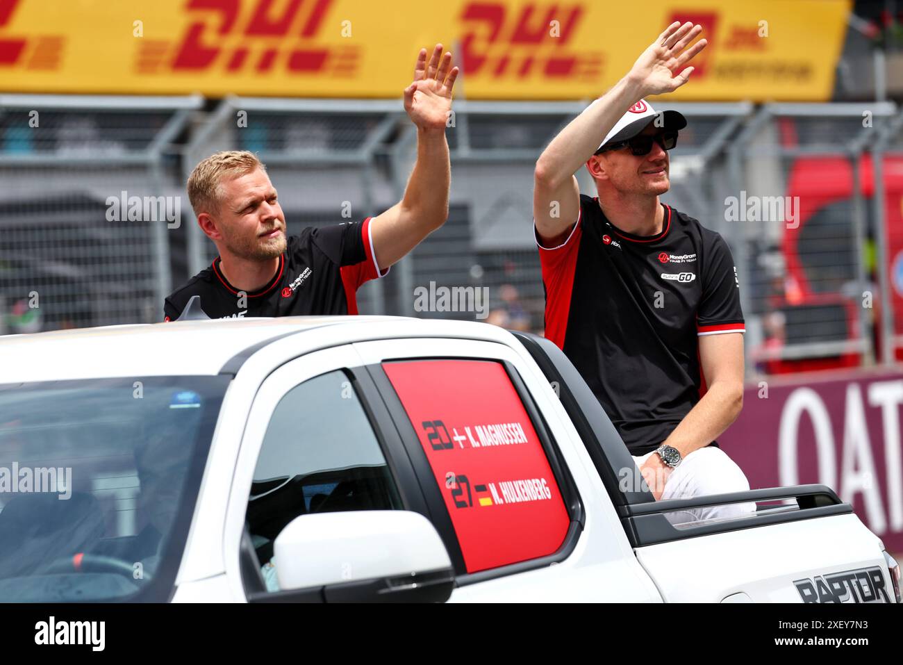 Spielberg, Austria. 30th June, 2024. (L to R): Kevin Magnussen (DEN) Haas F1 Team and Nico Hulkenberg (GER) Haas F1 Team on the drivers' parade. Formula 1 World Championship, Rd 11, Austrian Grand Prix, Sunday 30th June 2024. Spielberg, Austria. Credit: James Moy/Alamy Live News Stock Photo