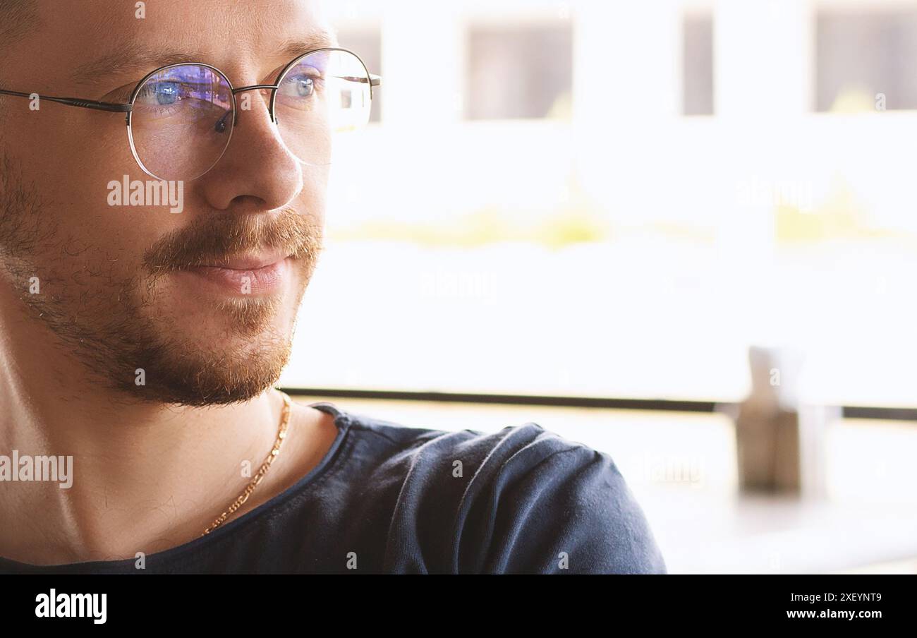 Portrait of a young guy with glasses Stock Photo - Alamy