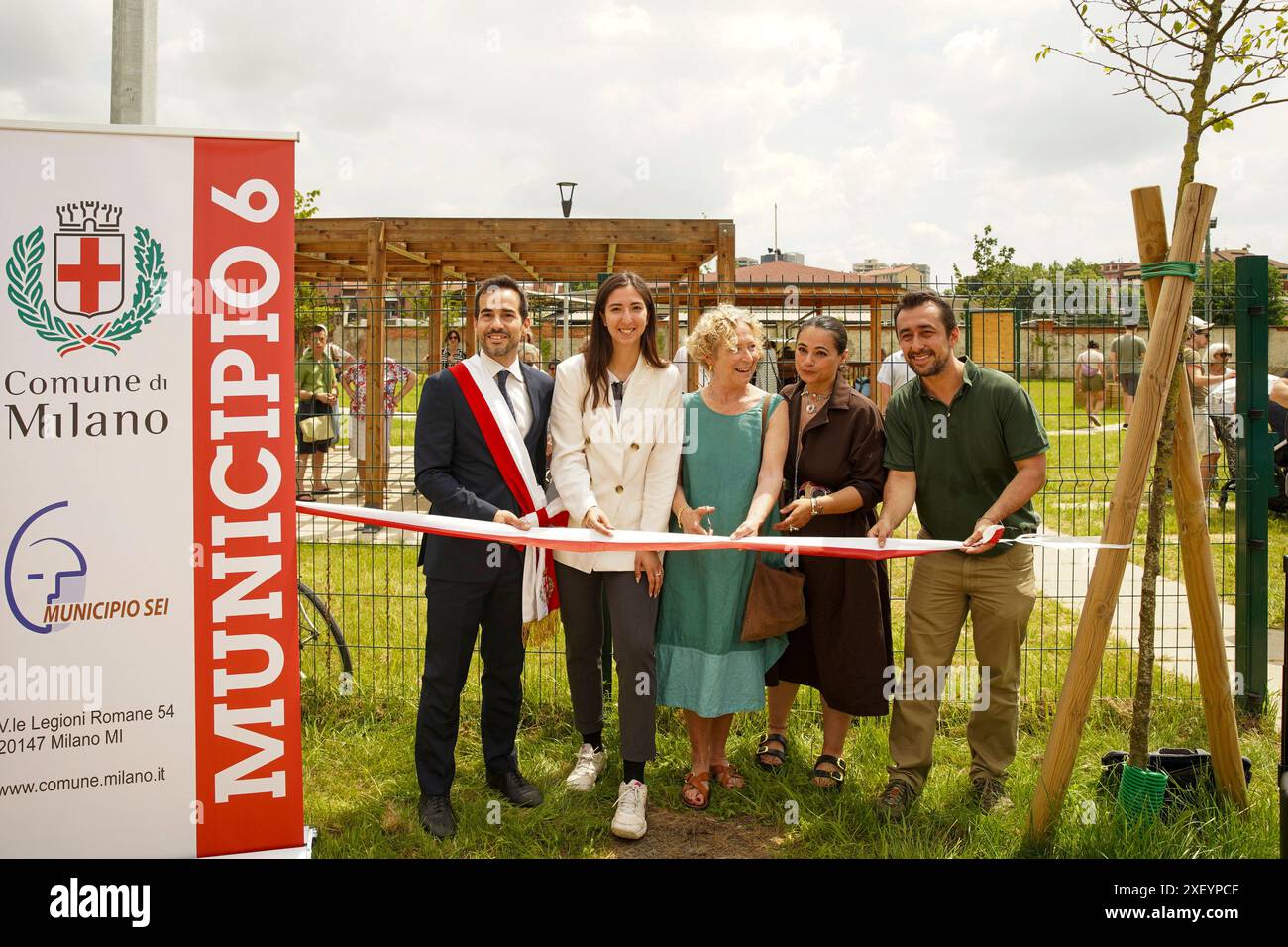 Milano, Italia. 30th June, 2024. Il taglio del nastro con l'assessore Elena Grandi, l'assessore Gaia Romani e il presidente del municipio 6 Santo Minniti all'inaugurazione del parco via Giambellino - Milano - Italia - Sabato 29 Giugno 2024 (Foto Marco Cremonesi/LaPresse) The ribbon cutting with councilor Elena Grandi, councilor Gaia Romani and Santo Minniti President of municipality 6 at the inauguration of the park via Giambellino - Milan - Italy - Saturday 29 June 2024 (Photo Marco Cremonesi/LaPresse) Credit: LaPresse/Alamy Live News Stock Photo