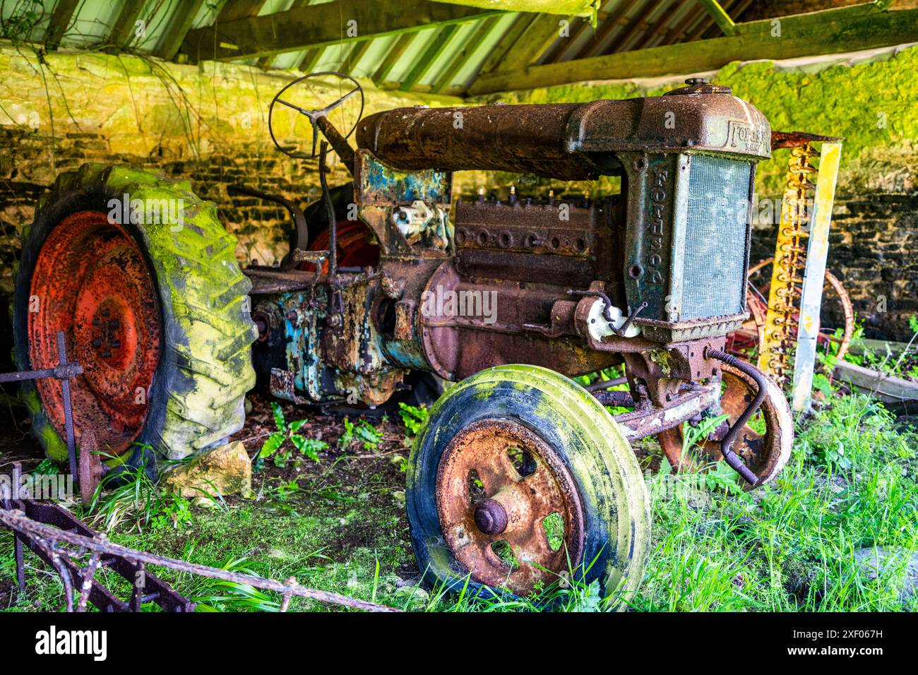 Rusty Major A rusty unrestored Fordson Major in a barn at Tyneham Farm at the ...