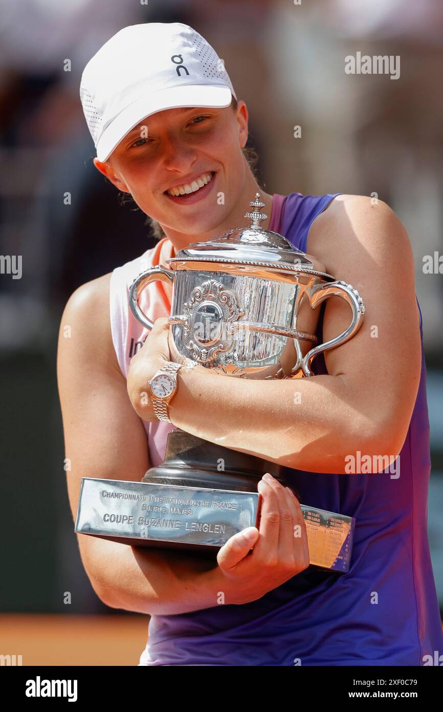 French Open 2024 Champion Iga Swiatek of Poland is holding the trophy ...