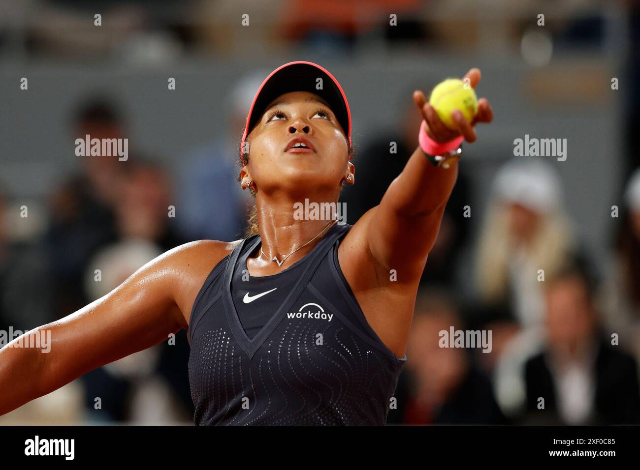 Japanese tennis player Naomi Osaka in action at the French Open 2024