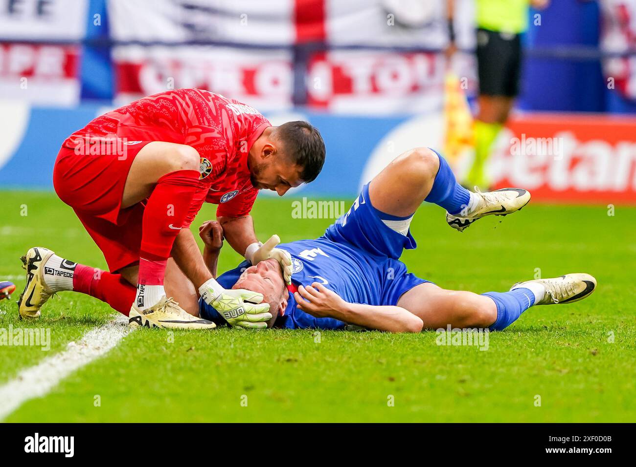 GELSENKIRCHEN, GERMANY - JUNE 30: goalkeeper Martin Dúbravka of Slovakia checks on Denis Vavro of Slovakia during the UEFA Euro 2024, Round of 16 match between England and Slovakia at Gelsenkirchen on June 30, 2024 in Gelsenkirchen, Germany. (Photo by Andre Weening/Orange Pictures) Credit: Orange Pics BV/Alamy Live News Stock Photo