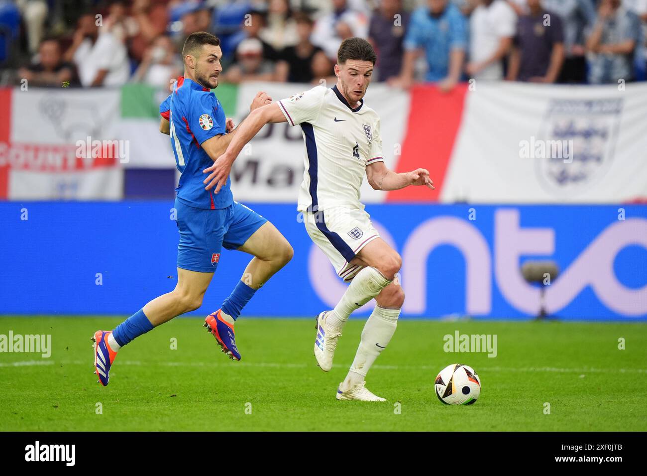 England's Declan Rice (right) and Slovakia's Matus Bero battle for the