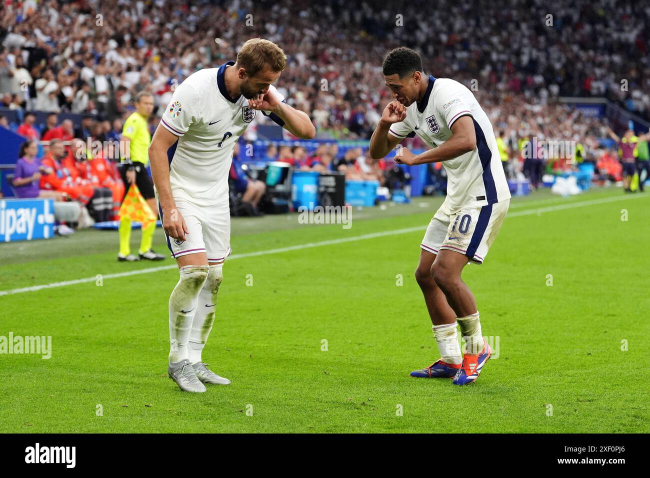 England's Harry Kane celebrates with Jude Bellingham after scoring