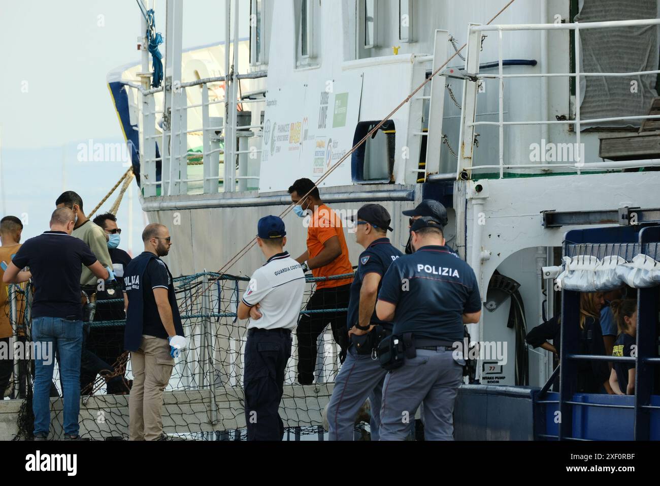 Marine escorting refugees hi-res stock photography and images - Alamy