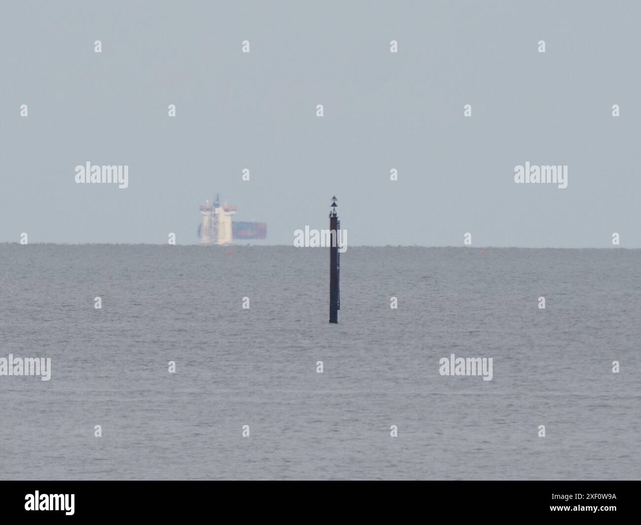 Sheerness, Kent, UK. 30th June, 2024. A container ship (Wec Van Eyck ...