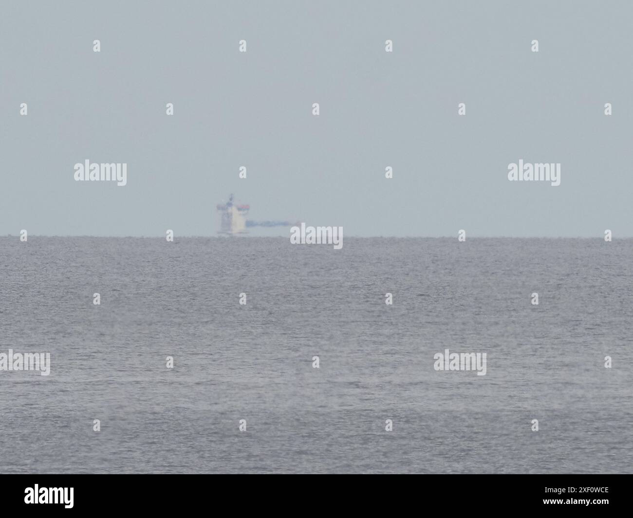 Sheerness, Kent, UK. 30th June, 2024. A container ship (Wec Van Eyck ...