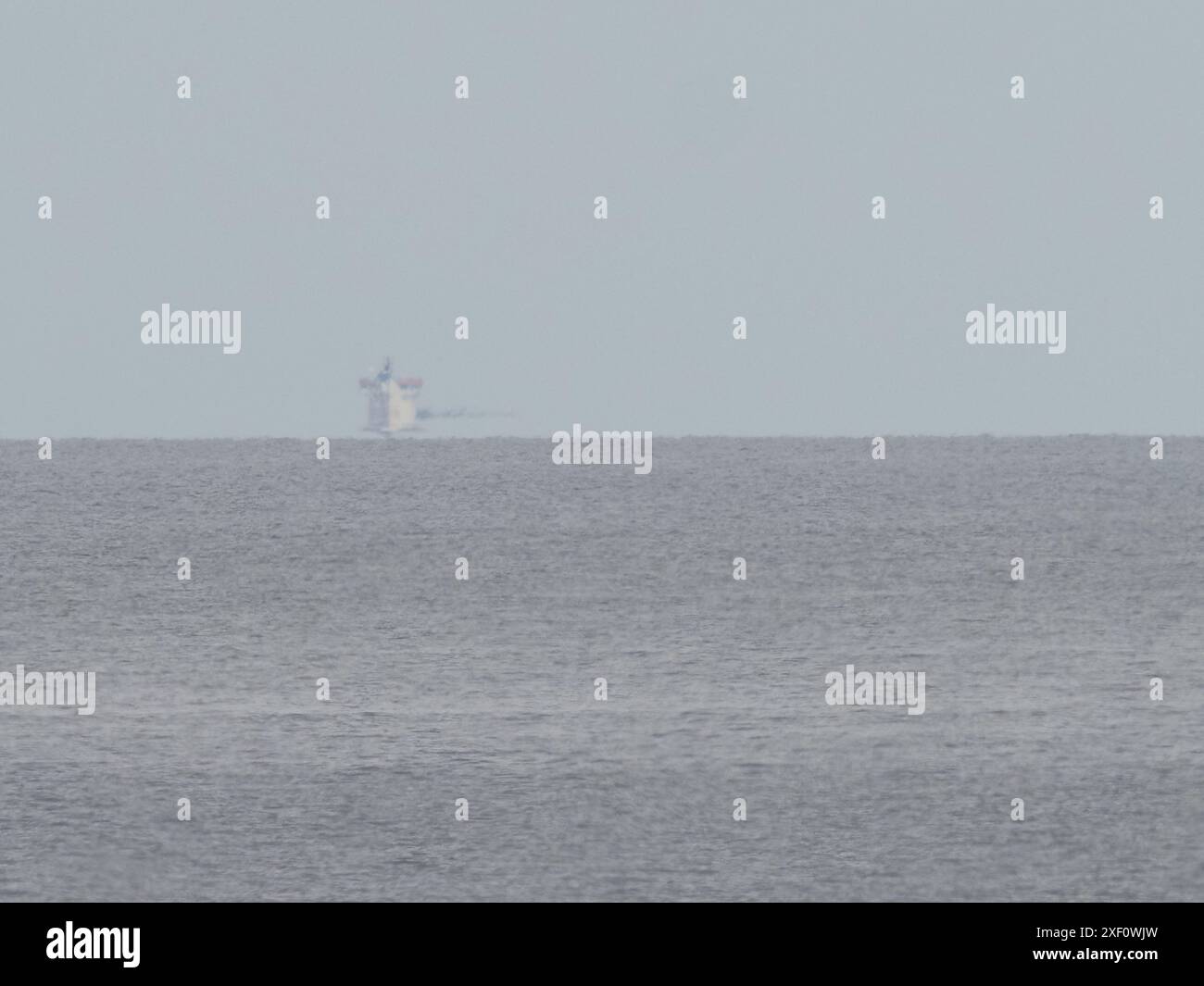 Sheerness, Kent, UK. 30th June, 2024. A container ship (Wec Van Eyck ...