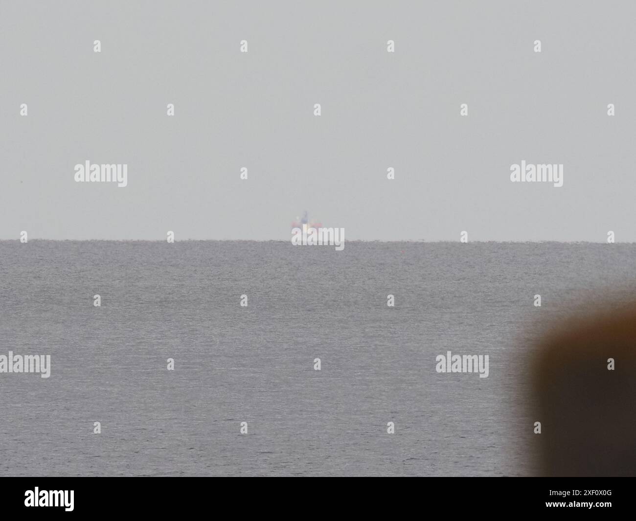 Sheerness, Kent, UK. 30th June, 2024. A container ship (Wec Van Eyck ...