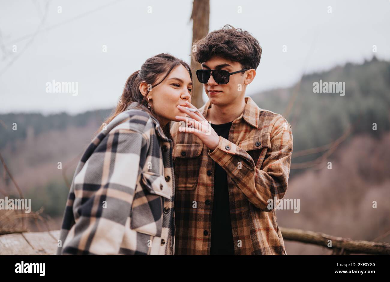 Sharing a cigarette hi-res stock photography and images