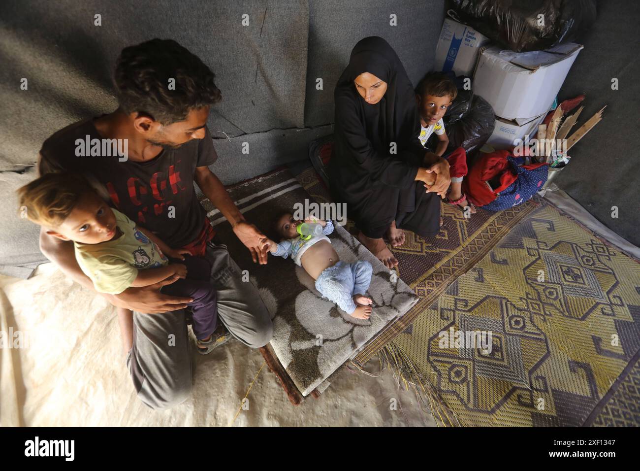 Noura Abu Al-Saud, a displaced Palestinian, lives in a tent inside a ...