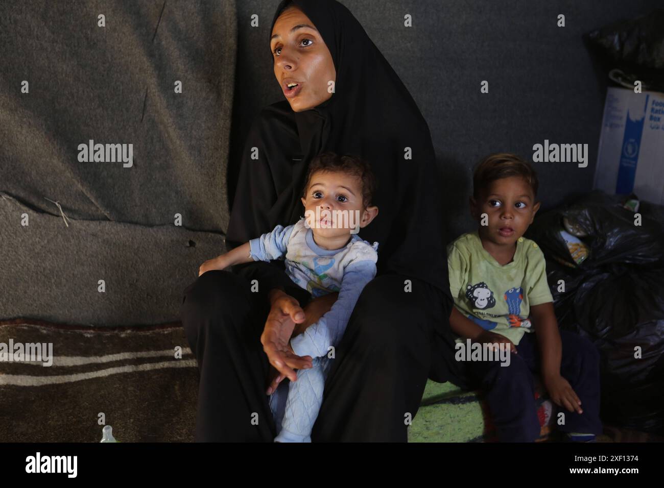 Noura Abu Al-Saud, a displaced Palestinian, lives in a tent inside a ...