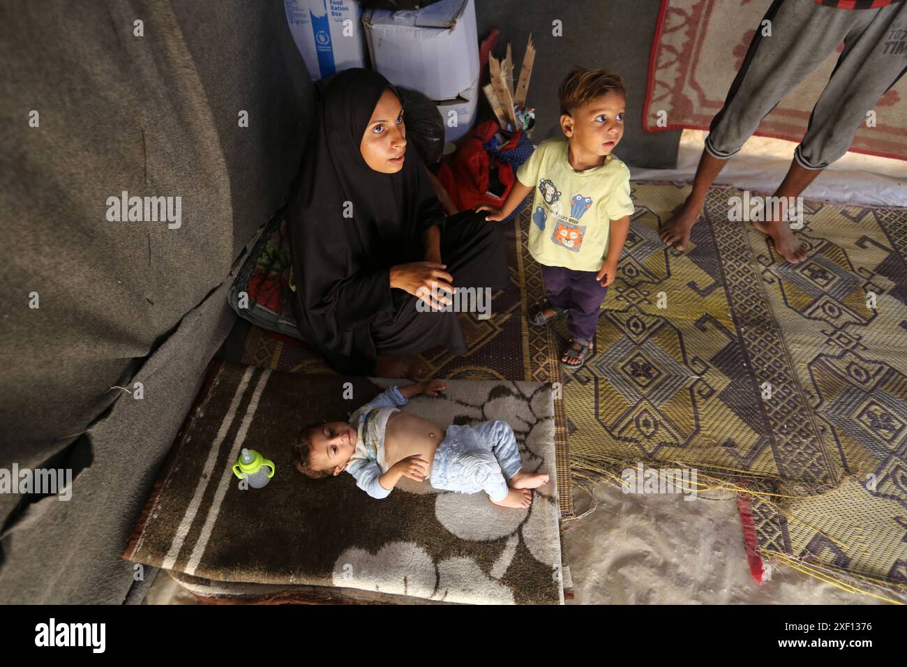 Noura Abu Al-Saud, a displaced Palestinian, lives in a tent inside a ...