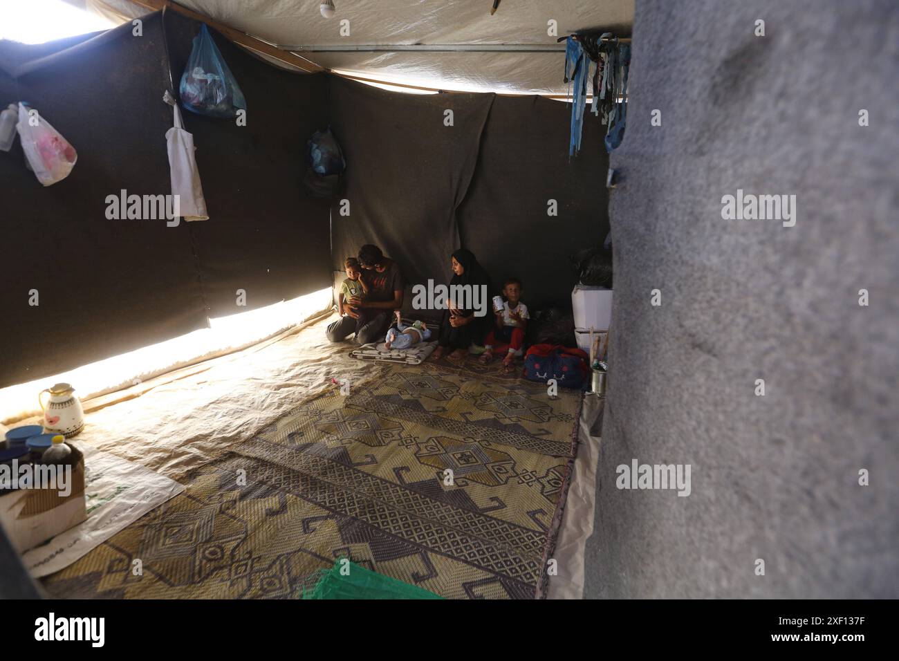 Noura Abu Al-Saud, a displaced Palestinian, lives in a tent inside a ...
