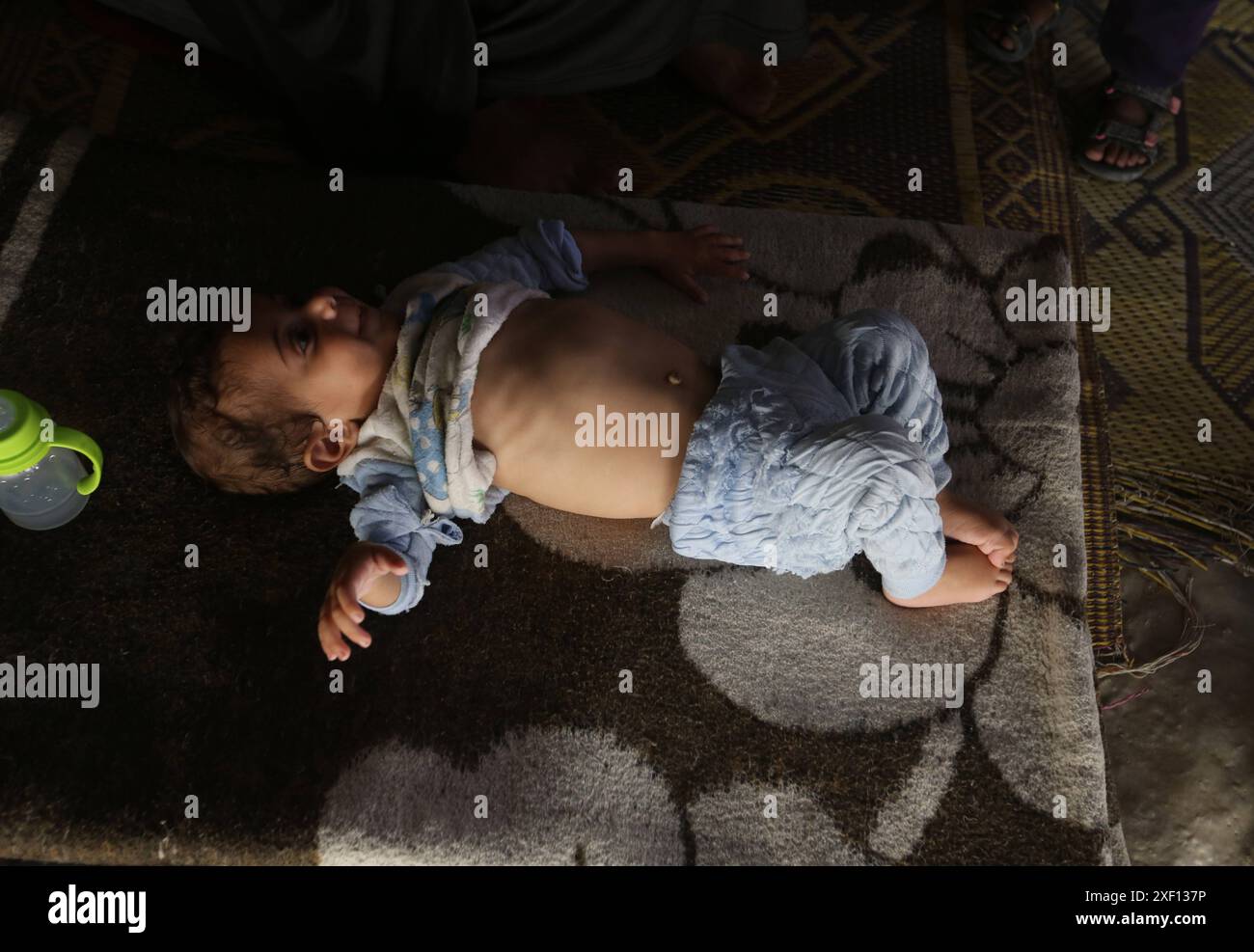 Noura Abu Al-Saud, a displaced Palestinian, lives in a tent inside a ...