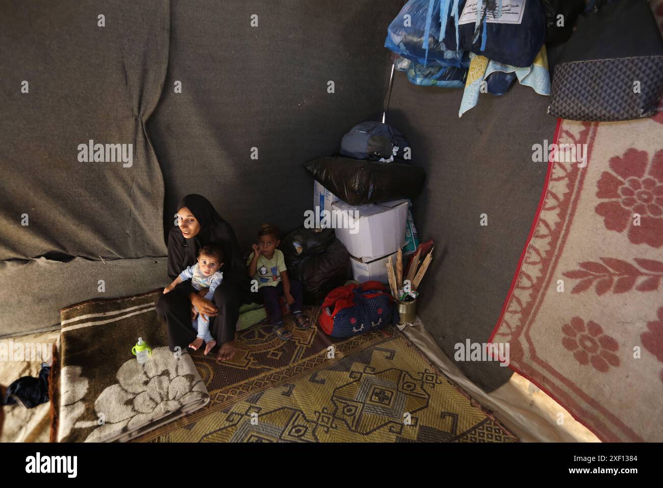 Noura Abu Al-Saud, a displaced Palestinian, lives in a tent inside a ...