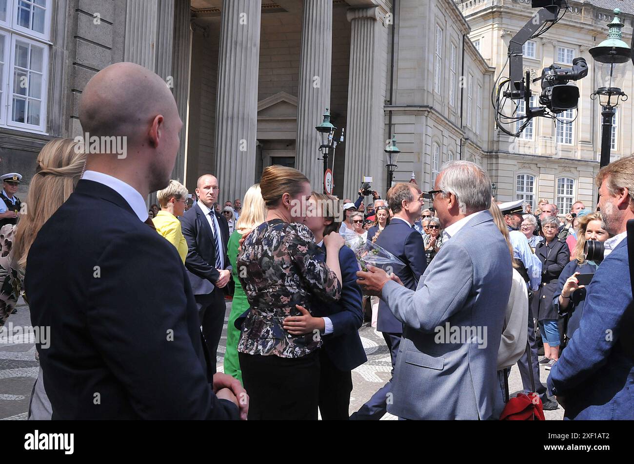 Copenhagen /Denmark./ 27June 2019/ Denmark's new prime miniter Ms.mette Frederiksen greets her father and two children and her boy friend Bo tengberg after ptresenting her minister team to queen margrethe II of denamrk and pres media at infront the Amalienborg Palace in danish capital Copenhagen, she is 2nd ocial democrat prime minister and she is 2nd.female social democrate denmark prime minister, she with her family .. (Photo..Francis Dean / Deanpictures. Stock Photo