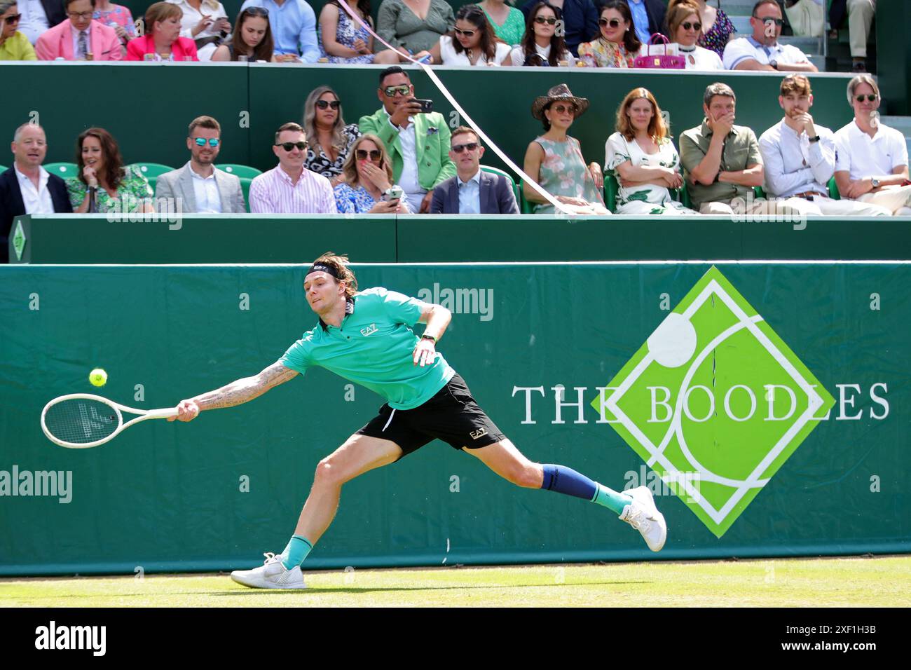 Alexander Bublik at full stretch against Alexander Shevchenko during the Boodles Tennis Tournament at Stoke Park, Stoke Poges, Surrey, England on Saturday 29th June 2024. (Photo: Jon Bromley | MI News) Credit: MI News & Sport /Alamy Live News Stock Photo
