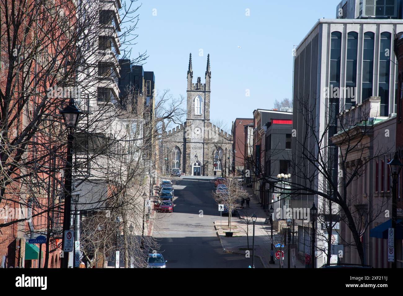 Looking north down Germain Street to St. John's Anglican stone church in downtown Saint John, New Brunswick, Canada Stock Photo