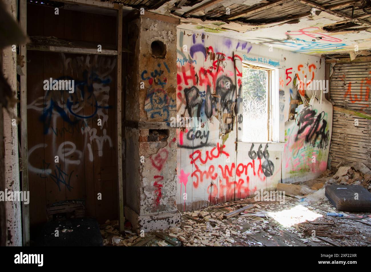 Graffiti in the living room inside the abandoned dilapidated house on Red Head Road in Saint John, New Brunswick, Canada Stock Photo