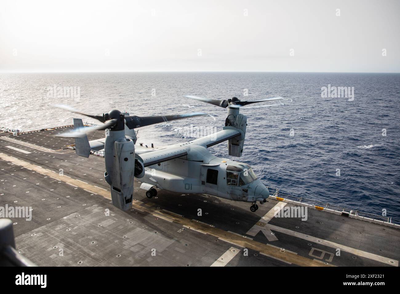 A U.S. Marine Corps MV-22B Osprey tiltrotor aircraft with Marine Medium ...