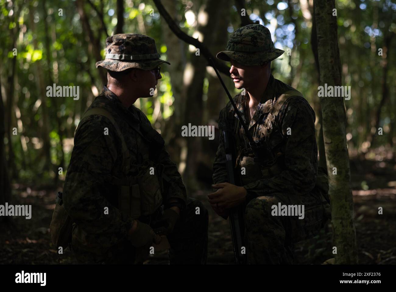 U.S. Marine Corps Lance Cpl. Carson Anway, right, a squad leader, and ...