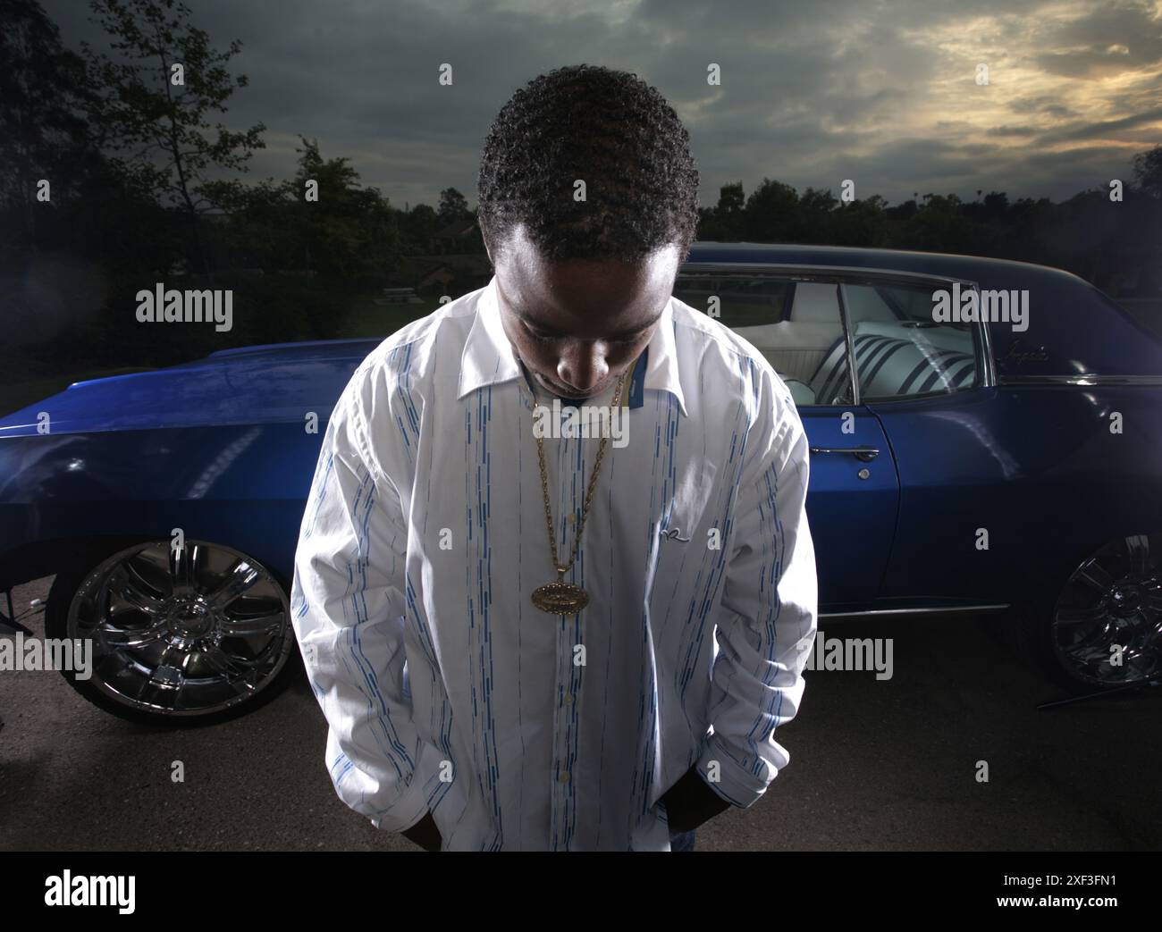 Rapper with classic car Stock Photo - Alamy