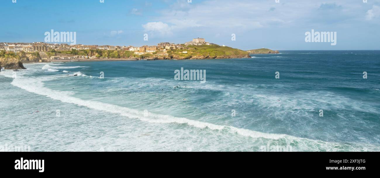 The iconic panoramic view over Newquay Bay to Towan Head on the coast of Newquay in Cornwall in the UK. Stock Photo