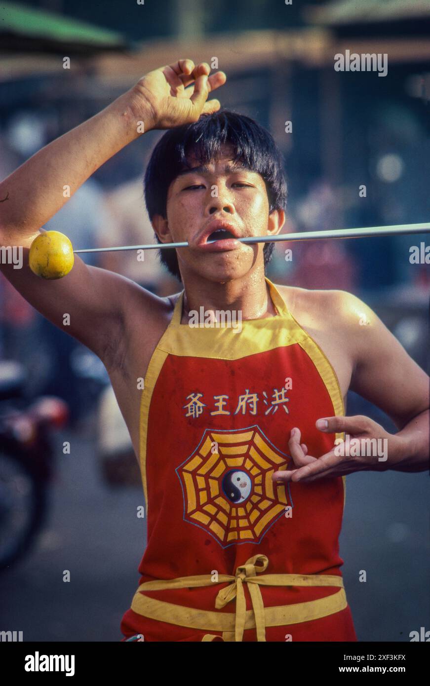 Malaysia, George Town, Penang - The Nine Emperor Gods Festival is a vegetarian festival with devotees performing horrific acts of self-mutilation, suc Stock Photo